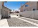 Gravel driveway leading to the garage with space for parking recreational vehicles at 3236 Manzanita Ln, Laughlin, NV 89029