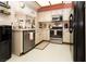 Efficient kitchen featuring stainless steel appliances, ample countertop space, and modern fixtures at 3236 Manzanita Ln, Laughlin, NV 89029
