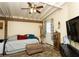 Cozy living space with a daybed, ottoman, and decorative elements, perfect for relaxation at 3236 Manzanita Ln, Laughlin, NV 89029