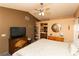 Spacious main bedroom with dual toned walls, carpeting, and en-suite bathroom access at 3236 Manzanita Ln, Laughlin, NV 89029