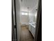 Clean bathroom with white vanity, tile flooring, and shower-tub combination at 3710 Royal Fern Cir, Las Vegas, NV 89115