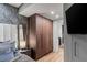 Modern bedroom features beautiful wallpaper, closet, and ensuite bathroom at 3726 Las Vegas Blvd # 606, Las Vegas, NV 89158