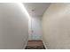 Modern hallway with wallpaper and door at 3726 Las Vegas Blvd # 606, Las Vegas, NV 89158