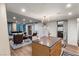 Spacious living area with kitchen, modern decor, and natural light at 3726 Las Vegas Blvd # 606, Las Vegas, NV 89158