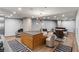 Open concept living and kitchen area with modern decor and city views at 3726 Las Vegas Blvd # 606, Las Vegas, NV 89158