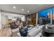 Open-concept living room and kitchen with cityscape views at 3726 Las Vegas Blvd # 606, Las Vegas, NV 89158