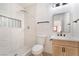 Modern bathroom with a tiled walk-in shower, stylish vanity, and sleek fixtures at 4237 E Twain Ave, Las Vegas, NV 89121