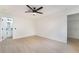 Minimalist bedroom with light hardwood floors and a walk-in closet at 4237 E Twain Ave, Las Vegas, NV 89121