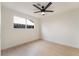 Bright bedroom with laminate flooring, a modern ceiling fan, and a window at 4237 E Twain Ave, Las Vegas, NV 89121