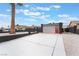 Inviting single-story home with a modern driveway and secure gated entrance, offering privacy and style at 4237 E Twain Ave, Las Vegas, NV 89121