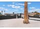 Well-kept front yard with secure gate, offering privacy and enhanced curb appeal to the house at 4237 E Twain Ave, Las Vegas, NV 89121