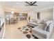 Open-concept living and kitchen area with stylish decor, natural light and light hardwood floors at 4237 E Twain Ave, Las Vegas, NV 89121