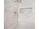 Close-up of a marble tiled shower with a niche and rain shower head at 4237 E Twain Ave, Las Vegas, NV 89121