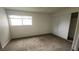 This cozy bedroom features soft carpet, closet, and a window offering natural light at 4310 Lynnann Dr, Las Vegas, NV 89110
