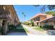 Street view of townhomes with desert landscaping on front lawns at 4310 Lynnann Dr, Las Vegas, NV 89110