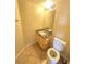 Compact half-bathroom with a granite countertop and tile flooring at 451 Rumford Pl, Henderson, NV 89074