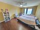 This lovely bedroom offers hardwood floors and natural light at 451 Rumford Pl, Henderson, NV 89074