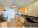 A kitchen with granite counters and stainless steel appliances at 451 Rumford Pl, Henderson, NV 89074