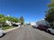 Residential street with neat landscaping and sidewalks at 451 Rumford Pl, Henderson, NV 89074