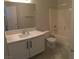 Clean, well-maintained bathroom featuring a tub, shower, modern vanity, and updated fixtures at 4555 E Sahara Ave # 226, Las Vegas, NV 89104