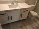 This updated bathroom features new cabinets, countertops, and a modern sink basin at 4555 E Sahara Ave # 226, Las Vegas, NV 89104