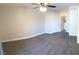 Neutral bedroom with ensuite bathroom access and ample natural light from the windows at 4555 E Sahara Ave # 226, Las Vegas, NV 89104