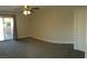 Comfortable bedroom with a ceiling fan and sliding door access to a balcony at 4555 E Sahara Ave # 226, Las Vegas, NV 89104