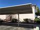 Covered carport with assigned parking and nearby building access at 4555 E Sahara Ave # 226, Las Vegas, NV 89104
