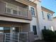 Exterior view of a two-story apartment showcasing balconies and multiple windows at 4555 E Sahara Ave # 226, Las Vegas, NV 89104