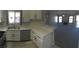 Open kitchen view leading to the living room and featuring stainless steel appliances at 4555 E Sahara Ave # 226, Las Vegas, NV 89104