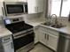 Modern kitchen features stainless steel appliances and a bright, clean design at 4555 E Sahara Ave # 226, Las Vegas, NV 89104
