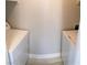 Convenient laundry room with side-by-side washer and dryer setup for easy chores at 4555 E Sahara Ave # 226, Las Vegas, NV 89104