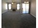 Large living room features carpeting, recessed lighting, and a fireplace for relaxing at 4555 E Sahara Ave # 226, Las Vegas, NV 89104