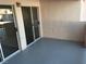 Outdoor patio area with sliding glass doors. Perfect for relaxing and outdoor enjoyment at 4555 E Sahara Ave # 226, Las Vegas, NV 89104