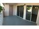 Outdoor patio area with sliding glass doors, ample space, and a relaxing environment at 4555 E Sahara Ave # 226, Las Vegas, NV 89104