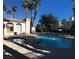 Community pool and spa area with poolside seating and well-kept grounds at 4555 E Sahara Ave # 226, Las Vegas, NV 89104
