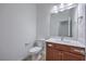 Bathroom featuring a single vanity with quartz countertop and a toilet at 508 Cadence View Way, Henderson, NV 89011