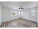 Bedroom featuring wood-look floors, recessed lighting, ceiling fan and multiple windows at 508 Cadence View Way, Henderson, NV 89011
