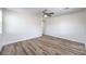 Spacious bedroom with wood-look floors, ceiling fan and lots of natural light at 508 Cadence View Way, Henderson, NV 89011