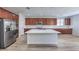 Bright and spacious kitchen with a center island, stainless steel appliances, and ample cabinet space at 508 Cadence View Way, Henderson, NV 89011