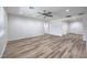 Spacious living room featuring wood-look floors, recessed lighting and ceiling fan at 508 Cadence View Way, Henderson, NV 89011