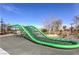 Community playground with climbing structure and walking path at 508 Cadence View Way, Henderson, NV 89011
