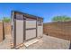 Outdoor storage shed next to a privacy fence at 508 Cadence View Way, Henderson, NV 89011