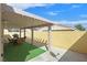 Backyard featuring a covered patio and outdoor seating, perfect for gatherings at 5109 Midnight Oil Dr, Las Vegas, NV 89122