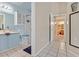 Bright bathroom featuring a classic vanity and enclosed shower stall at 5109 Midnight Oil Dr, Las Vegas, NV 89122