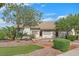 Attractive single-story home with well-manicured landscaping and a putting green at 5109 Midnight Oil Dr, Las Vegas, NV 89122