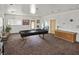 Game room with pool table, seating area, and natural light at 5109 Midnight Oil Dr, Las Vegas, NV 89122