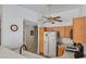 Kitchen featuring a white refrigerator, gas stove, and view to the dining area at 5109 Midnight Oil Dr, Las Vegas, NV 89122