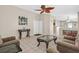 Spacious living room with tile flooring, neutral walls, and an open layout at 5109 Midnight Oil Dr, Las Vegas, NV 89122