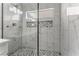 This renovated bathroom showcases a glass-enclosed shower with modern tile and fixtures at 5725 Cedar Ave, Las Vegas, NV 89110